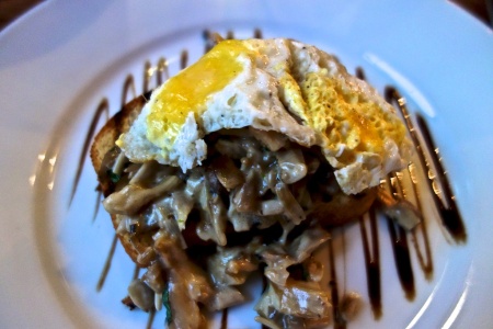 Fricassee of wild mushrooms with a quail's egg